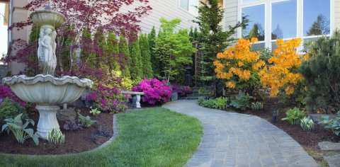 Custom Designed Seasonal Color Landscaping With Stone Path, Fountain, Trees, Shrubs, And Beautiful Multi-colored Flowers